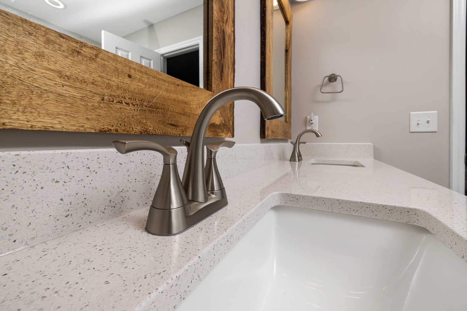 Newly installed kitchen faucet delivering clean running water